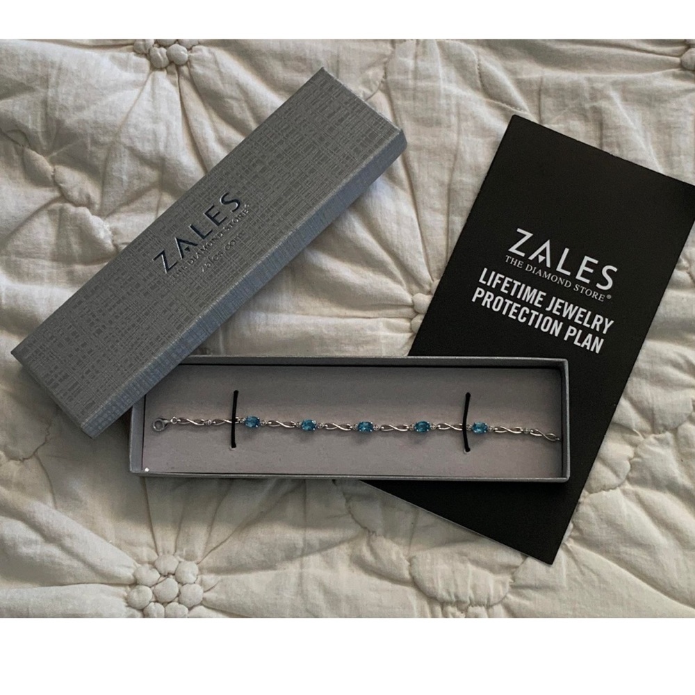 Sterling Silver (925) Oval Swiss Blue Topaz Infinity Link Bracelet